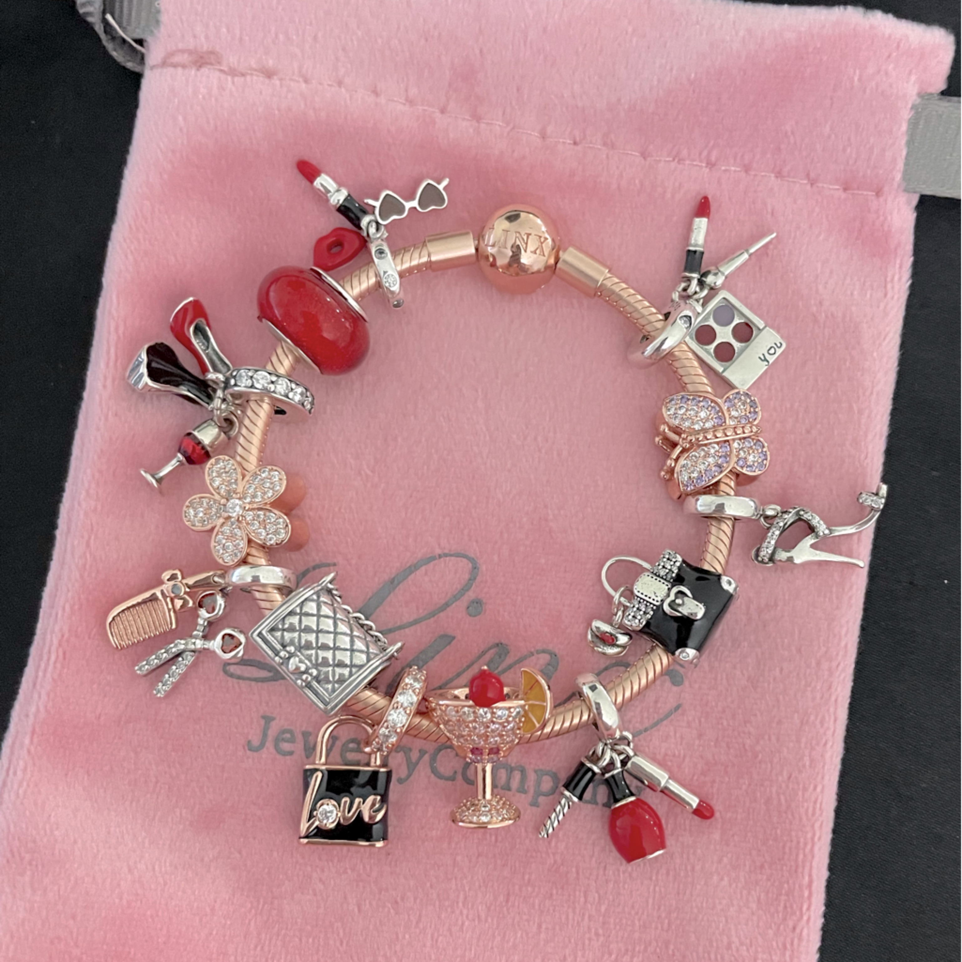 Linx Rose Gold Snake Chain Bracelet With Beauty And Fashion Themed Charms